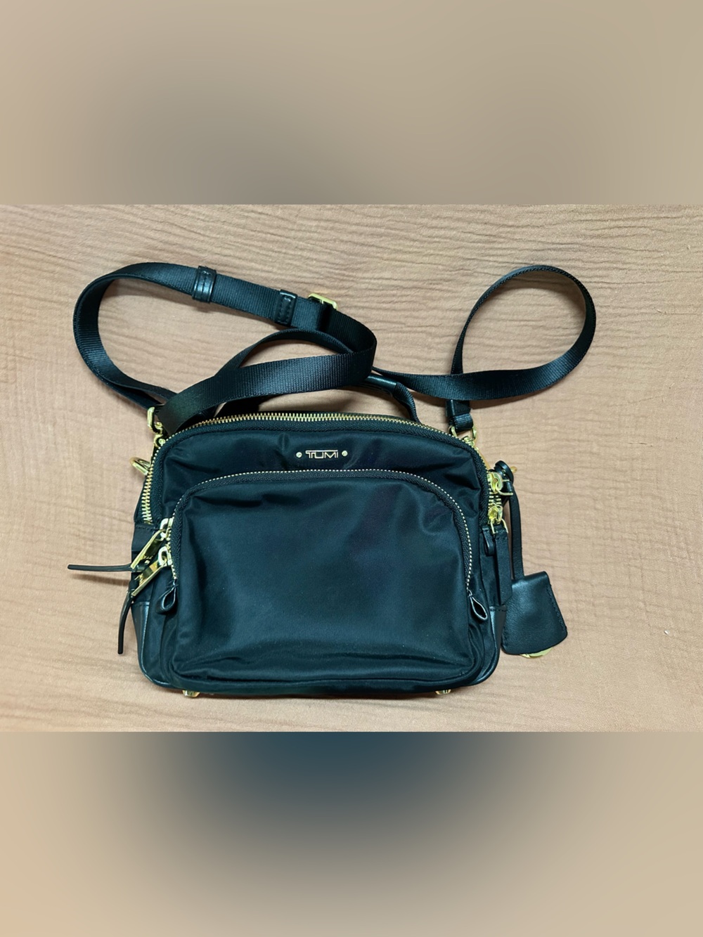 Tumi Black Nylon Crossbody Messenger with Gold Hardware